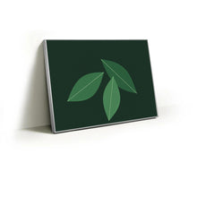 Load image into Gallery viewer, Banana Leaves fabric wall art print in a slim silver Knittworks frame