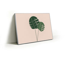 Load image into Gallery viewer, Monstera Pair fabric wall art print in a slim silver Knittworks frame