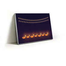 Load image into Gallery viewer, Row of glowing diyas fabric wall art print in a slim silver Knittworks frame
